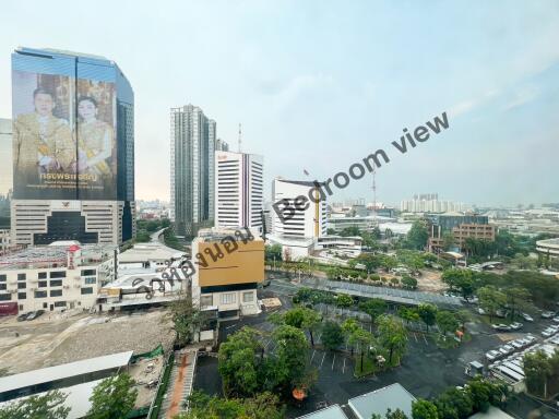 Urban skyline with high-rise buildings viewed from an apartment window