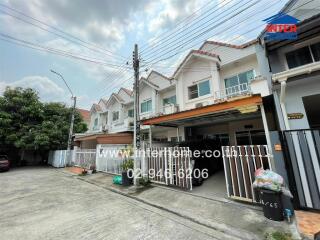 Exterior view of modern townhouses in a residential area