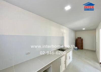 Spacious and clean kitchen with ample storage
