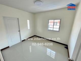 Bright and spacious empty bedroom with large window