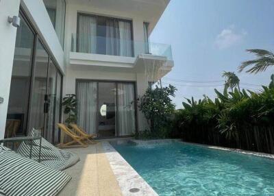 Modern house with swimming pool and balcony