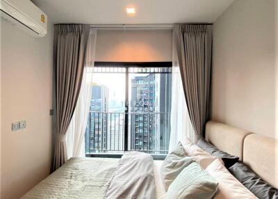 Modern urban bedroom with city view