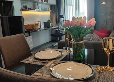 Elegantly set dining table in a modern apartment