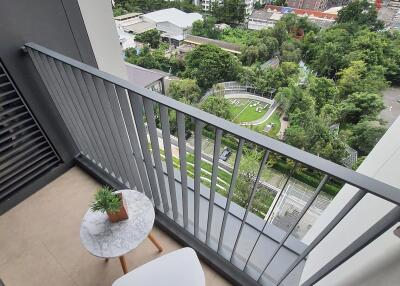 Cozy balcony with modern furniture overlooking the city