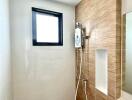 Modern and clean bathroom with wooden accents and a handheld shower