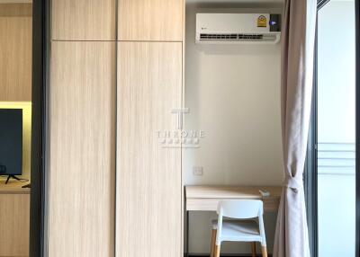 Compact modern bedroom with built-in wardrobe and study nook