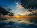 Luxurious outdoor infinity pool overlooking sunset