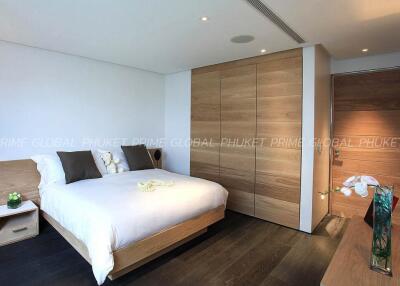 Elegant bedroom with modern wooden decor and minimalistic design