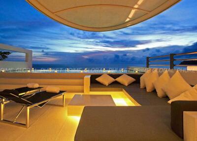 Luxurious rooftop patio with panoramic evening sky view