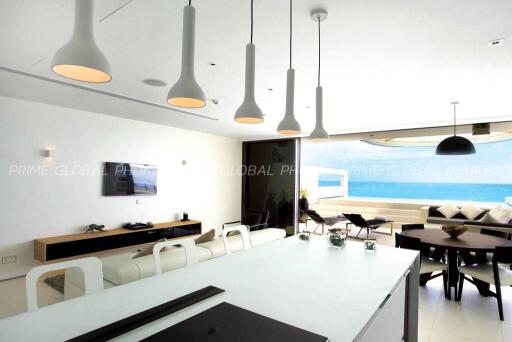 Modern spacious living room with integrated dining area