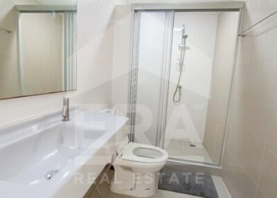 Modern white bathroom with bathtub and shower