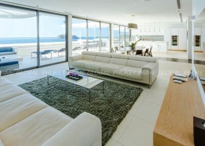 Spacious modern living room with ocean view and open plan layout