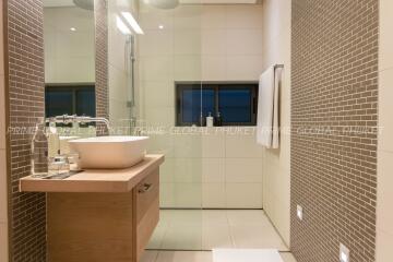 Modern bathroom interior with neat tiling