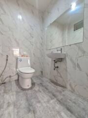 Modern bathroom with white marble finishing