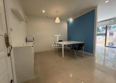 Modern kitchen with dining area and exterior view