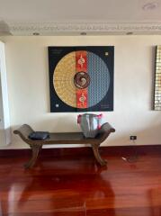 Elegant living room interior with traditional Asian decoration and artisan wooden bench