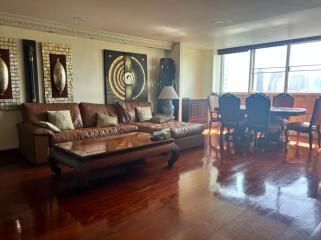 Spacious living room with elegant decor and abundant natural light