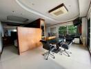 Spacious home office with modern amenities and large windows