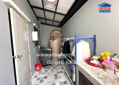 Spacious utility room with ample storage and natural light