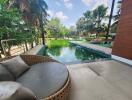 Outdoor area with pool and garden