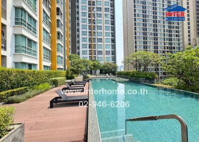 Outdoor swimming pool area in an apartment complex