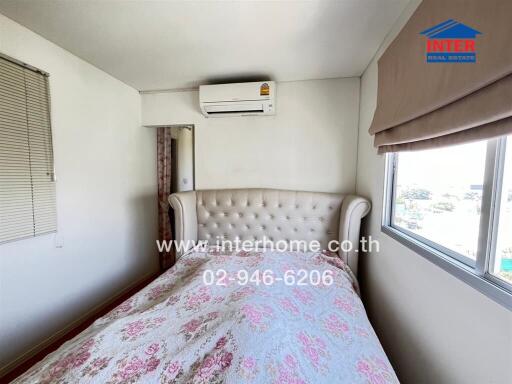 Cozy bedroom with air conditioning