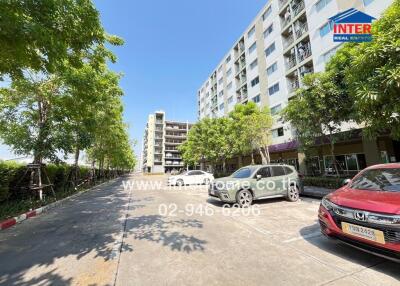 Residential building exterior with parking lot