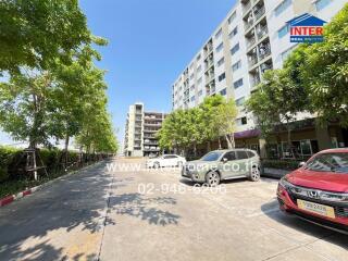 Residential building exterior with parking lot