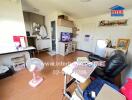 Living room with furniture and a TV