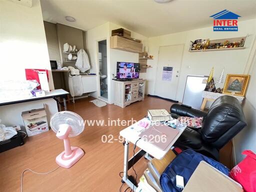 Living room with furniture and a TV