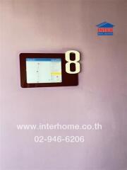 Building floor indicator with floor number 8