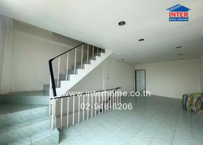Main living space with a staircase