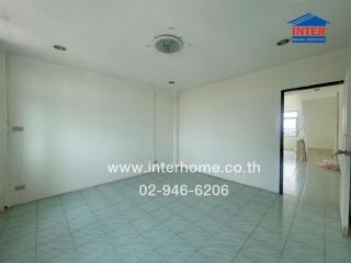 Empty room with tiled floor