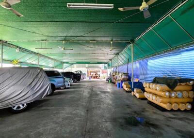 Covered garage with multiple parked cars