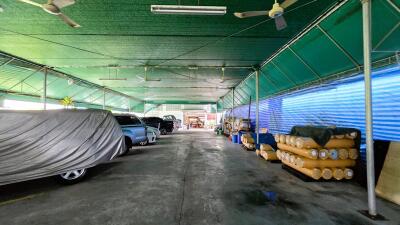 Covered garage with multiple parked cars