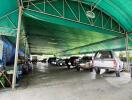 Covered parking garage with multiple vehicles