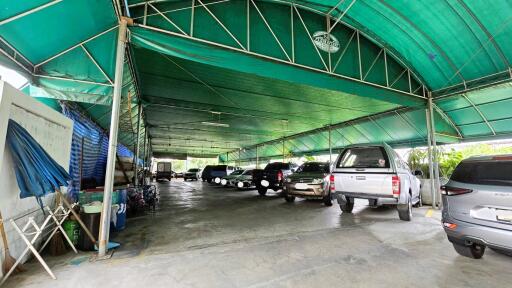 Covered parking garage with multiple vehicles