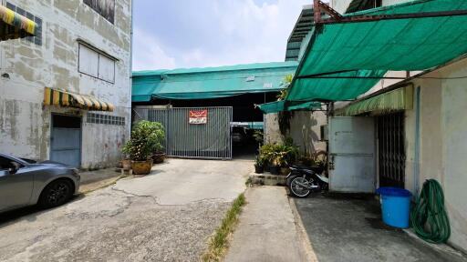 Outdoor entrance area with gated entrance