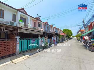 Exterior view of townhouses in a residential neighborhood