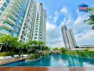 View of modern apartment buildings with a swimming pool