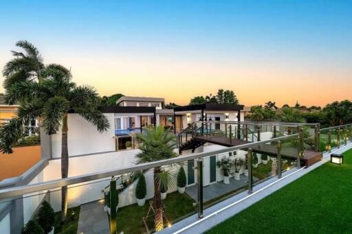 Modern building with balcony and garden