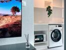 Modern laundry room with washing machine and cabinets