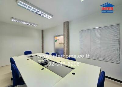 conference room with a table and chairs