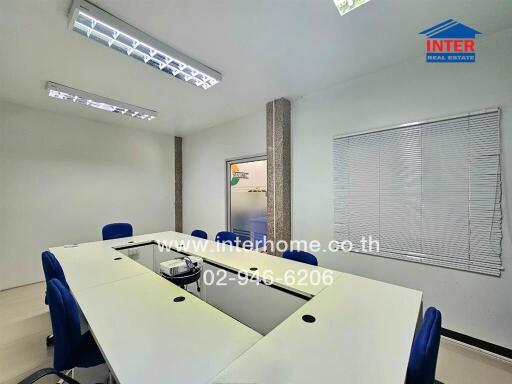 conference room with a table and chairs