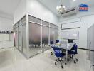 Modern office space with glass partitions and ergonomic chairs