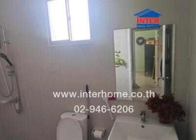 Modern bathroom with fixtures and a window