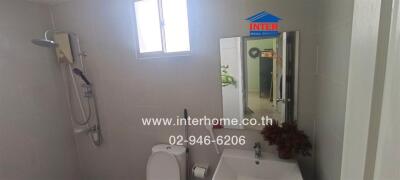 Modern bathroom with fixtures and a window