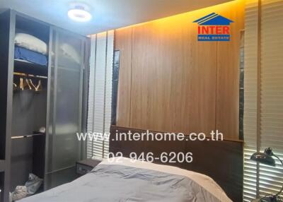 Modern bedroom with wardrobe and bed