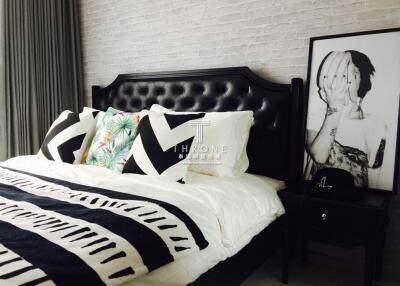 Modern bedroom with stylish decor.