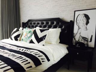 Modern bedroom with stylish decor.